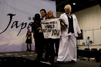 Rachelle (right) as Rufus Shinra from Final Fantasy VII: Advent Children